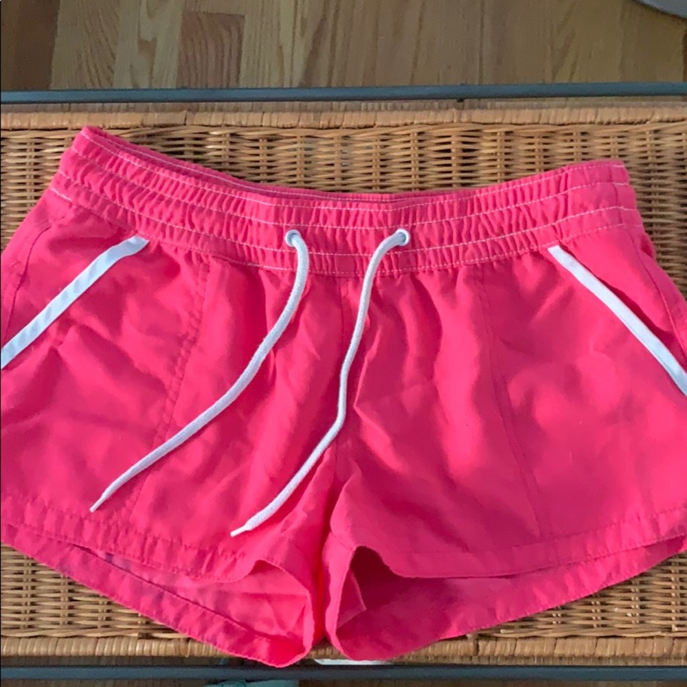 Neon pink swim trunks